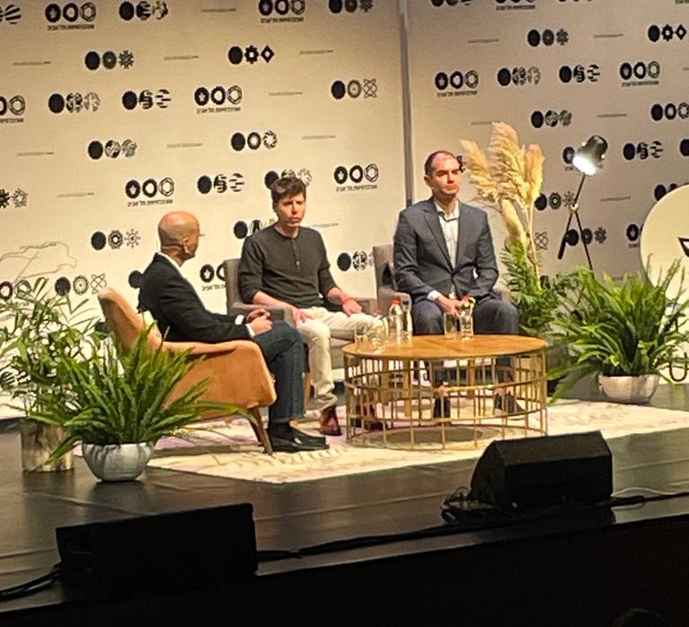 Sam Altman (centre) and Ilya Sutskever (right).